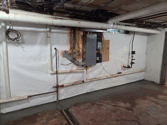The CleanSpace Wall System was installed along the basement walls to help create a cleaner, brighter appearance while working with the waterproofing system. If water enters through the wall, CleanSpace helps direct it down into the drainage system instead of allowing it to spread across the basement.
The interior drainage system was installed along the basement perimeter to collect water at the base of the foundation wall. Once collected, the water is directed to the sump pump system so it can be removed from the basement before it reaches the main floor.