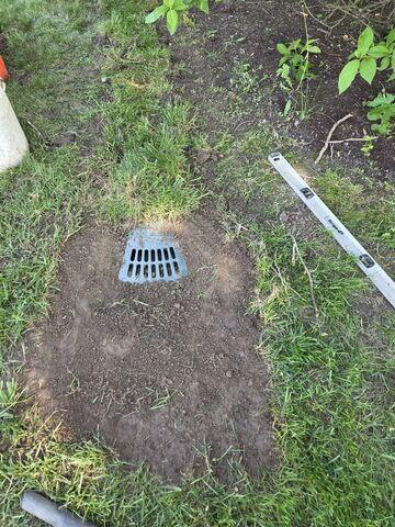 The LawnScape outlet was installed at the end of the discharge line to release water away from the home in a clean, low-profile way. This helps complete the waterproofing system by moving collected water away from the foundation.