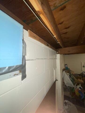 Before: Our Design Specialist, Romeo, recommended securing GeoLock Wall Anchors on the damaged foundation.