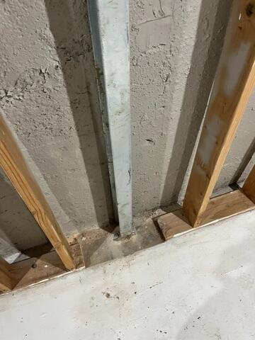 During: Our Foreman, Kingsley, and his crew worked hard to secure all the products throughout the basement.