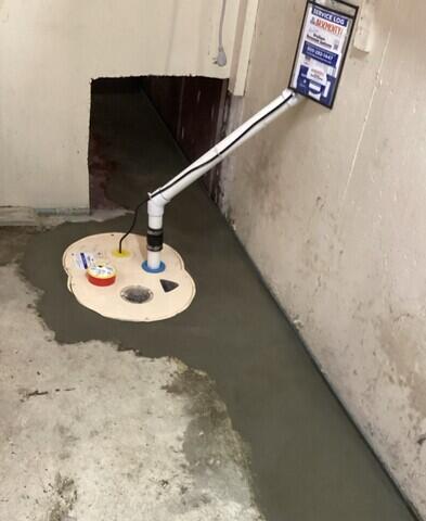 The basement is now protected from water by our WaterGuard drainage system and SuperSump Plus sump pump system!