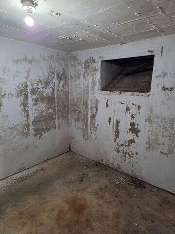 Before: Our Design Specialist, Dylan, recommended waterproofing the entire basement.