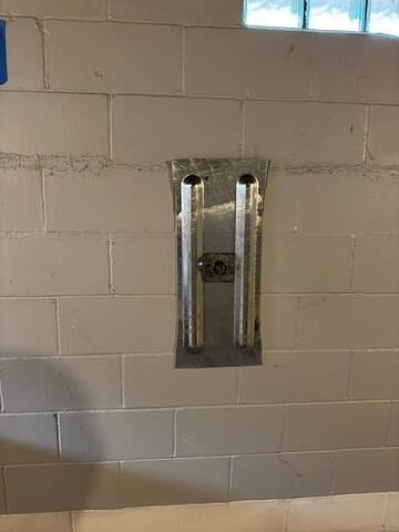 Once both plates are connected, they are tightened