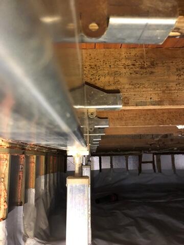 Smart jacks installed to support the floors above the Crawl Space.