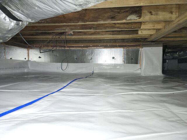 Crawl Space Encapsulation - SilverGlo barrier on walls