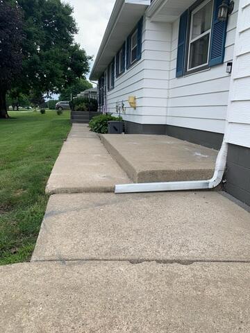 After: Our Foreman, Dylon, and his crew worked hard to secure the PolyLevel and NexusPro across the sidewalk.