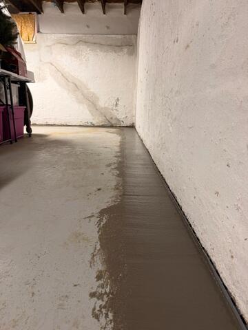 Our crew installed WaterGuard along the perimeter of the floor and the flooring was restored.