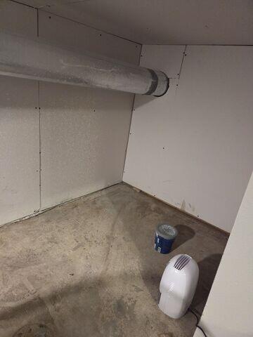 Before: Dylan, our Design Specialist, recommended waterproofing the water-damaged corner.
