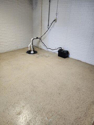 Before: Our Design Specialist, Brady, recommended taking out the old sump pump and replacing it with the TripleSafe.