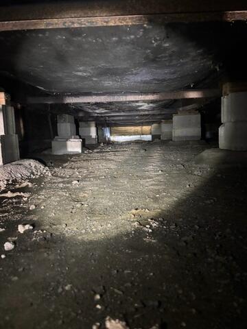 Before: Our Design Specialist, Jackson, recommended fully encapsulating the crawl space.