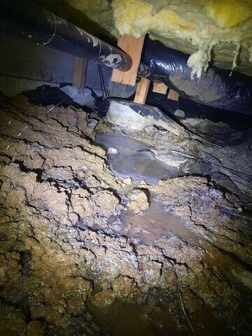 Water creating a muddy mess and damaging the old vapor barrier