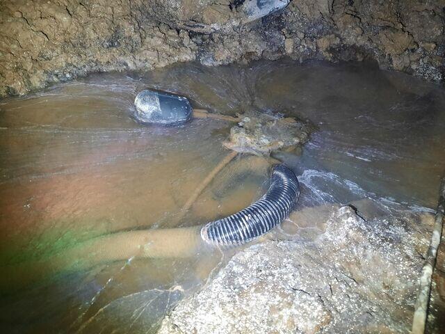 Flooded crawl space, with stagnant water festering