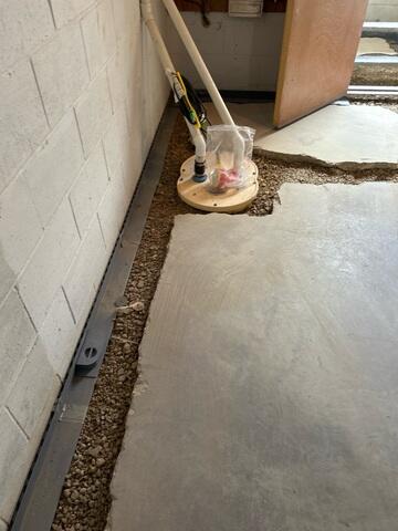 During: Our Foreman, Kiko, and his crew successfully secured all the products throughout the basement.