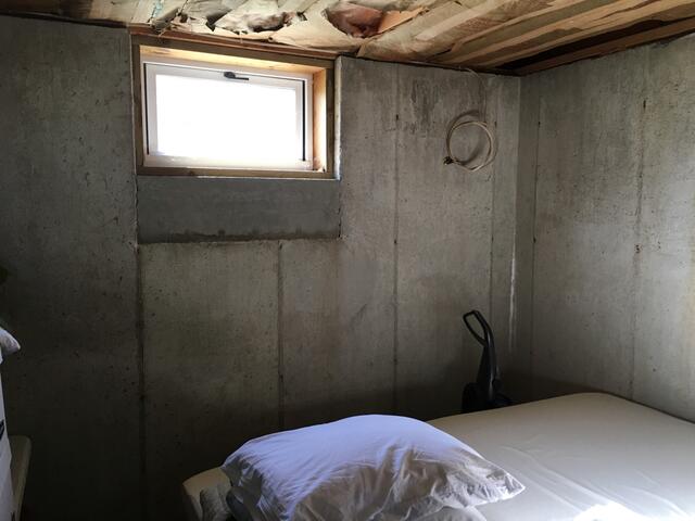 Before: Our Design Specialist recommended waterproofing the entire space.