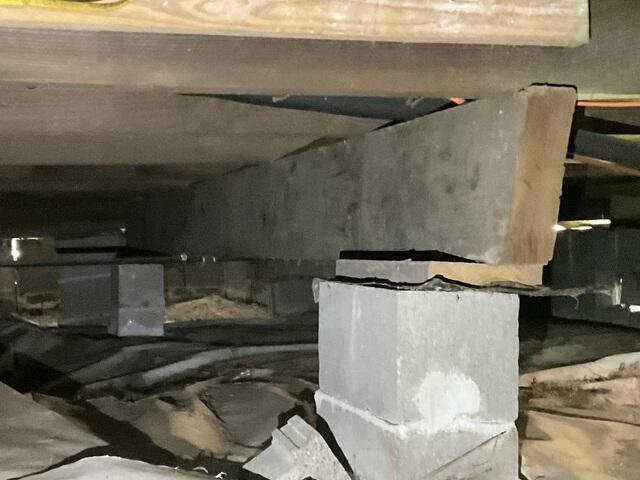 This temporary floor support gave out and started to rot; The same as the other flooring system.
