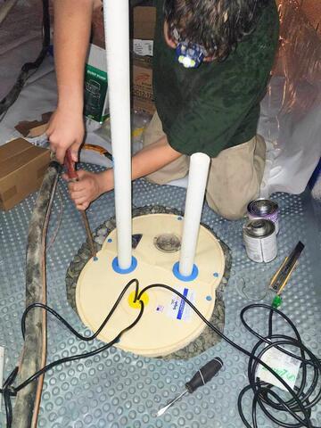 The Sump Pump will pump water out of the crawl space and away from the home.