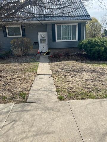 Before: The homeowner worried their walkway was becoming a serious tripping hazard.