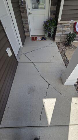 Before: Our Design Specialist, Derek, recommended lifting and repairing the damaged concrete slabs.