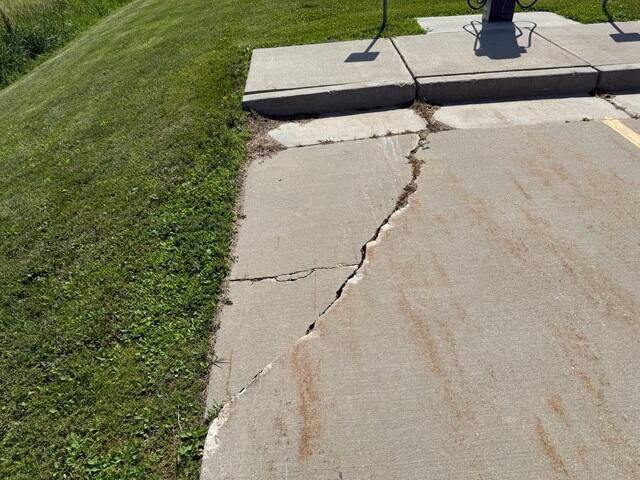 Before: Our Design Specialist, Patrick, recommended lifting and leveling the sinking areas of the concrete.
