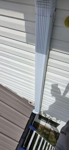 Downspout through deck