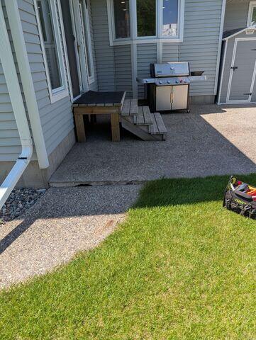 Before: Our Design Specialist, James, recommended lifting and leveling the sidewalk back to its original position.