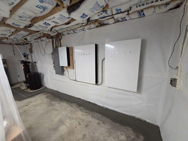 WaterGuard® - An interior perimeter drainage system positioned on top of the foundation footing and beneath the edge of the basement floor. WaterGuard captures incoming groundwater and wall water and directs it toward the sump pump system.
TrenchDrain™ - A grated drainage channel installed across the garage-door entrance to capture surface water entering through the opening and direct it into the basement waterproofing system. CleanSpace® Wall System - A durable wall system that intercepts water entering through foundation walls and directs it toward the basement's water-management system while providing a clean, bright appearance.