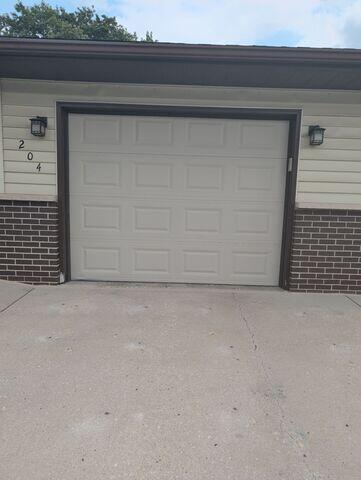 During: Our Foreman, Troy, and his crew worked hard to secure all the products below the damaged driveway.
