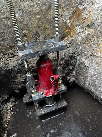 Push Pier that is used to lift and stabilize a  home's foundation.