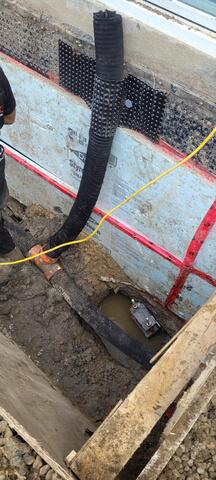 window well drain install with peirs