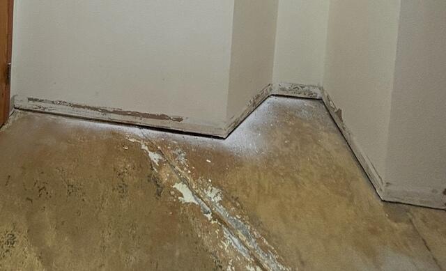 Before: Our Design Specialist, Dylan, recommended securing several waterproofing products throughout the basement.