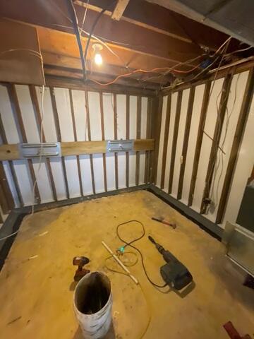 During: Our crew worked hard to secure all the waterproofing products throughout the basement.