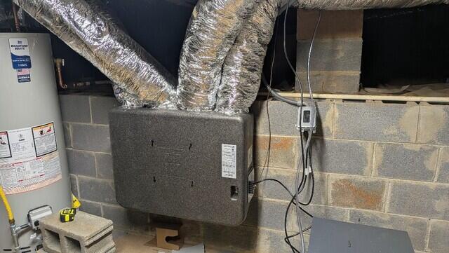 ERV unit mounted inside crawlspace