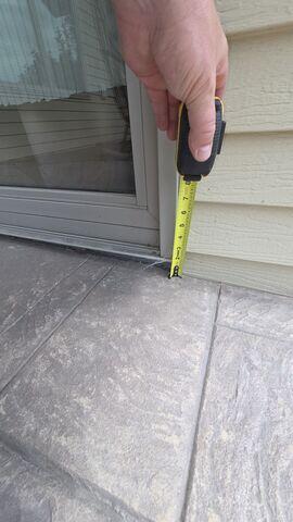 Before: Derek recommended lifting and leveling the damaged, sinking slabs.
