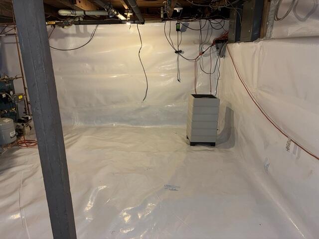 CleanSpace vapor barrier and Aspen Air Purifier installed in this basement.