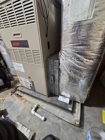 The homeowner's existing furnace and filter before installing the Breathe EZ.