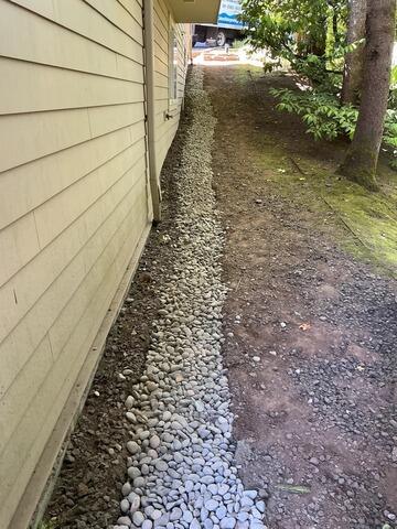 Our system will protect this homes foundation from groundwater damage, and because we installed the system at a slope, electricity will never be needed to carry collected water away from the home.