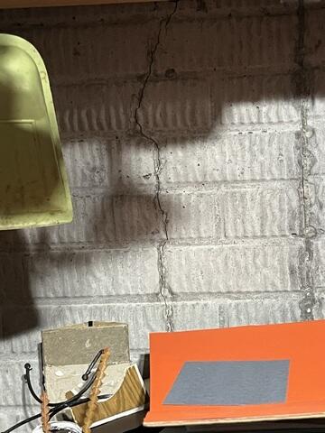 Before: Our Design Specialist noted the walls were cracking due to settlement.