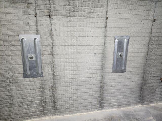 During: Our Foreman, Arturo, and his crew secured all the GeoLock Wall Anchors on the damaged walls.