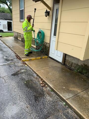 During: Our Foreman, Dylon, and his crew successfully lifted the walkway back to its original position.