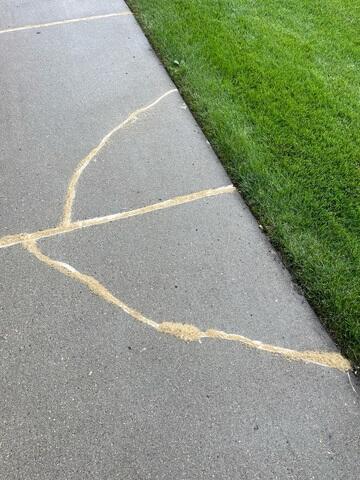 During: Charlie, one of our foremen, and his crew successfully lifted and repaired the cracks throughout the concrete.