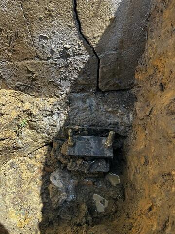 Push Piers  are steel pipes that are pushed deep into the ground, where they reach stronger soil. Brackets connect the piers to the foundation footing.