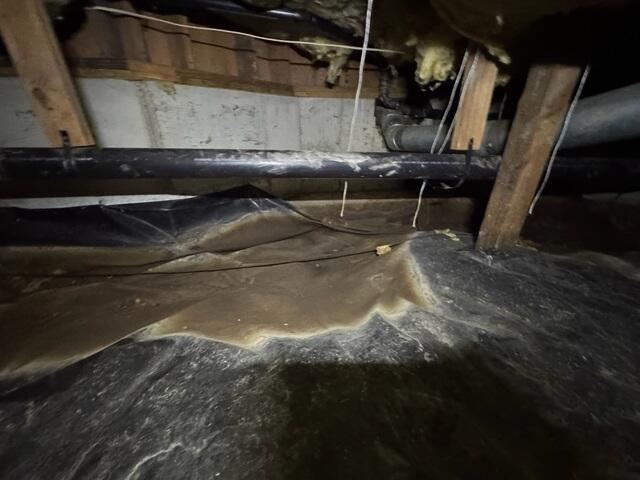 Evaporated water on vapor barrier