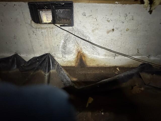 Foundation wall damaged by water stains