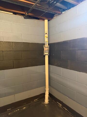 The piping was installed through the concrete floor in the basement and connected to the system outside