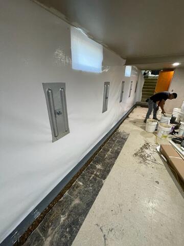 During: Our Foreman, Victor, and his crew worked hard to secure all the products throughout the basement.