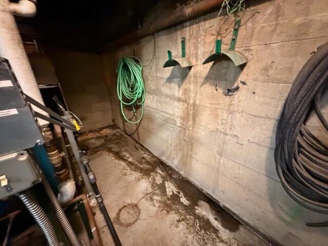 Before: Our Design Specialist, Ian, suggested waterproofing the entire basement.