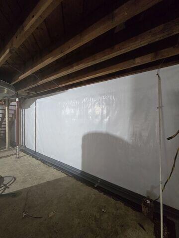 CleanSpace was attached to the walls and WaterGuard was added along the edges of the concrete floor