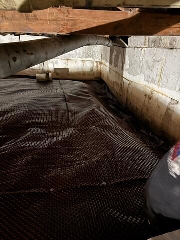 During: Our Foreman, Nanga, and his crew worked hard to secure all the products throughout the basement.