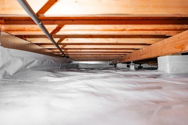 We installed CleanSpace over the crawl space floor to create a durable barrier between the ground and the space above, helping control moisture vapor from the soil. SilverGlo insulation panels were installed along the crawl space walls to help improve the thermal performance of the space.