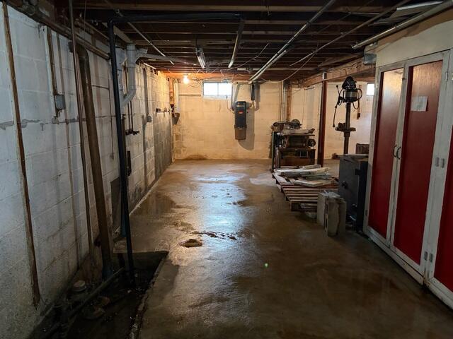 This Concord, New Hampshire, basement desperately needed support and waterproofing.
